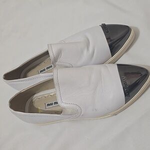 Miu Miu Women's White and Black Slip-On Shoes